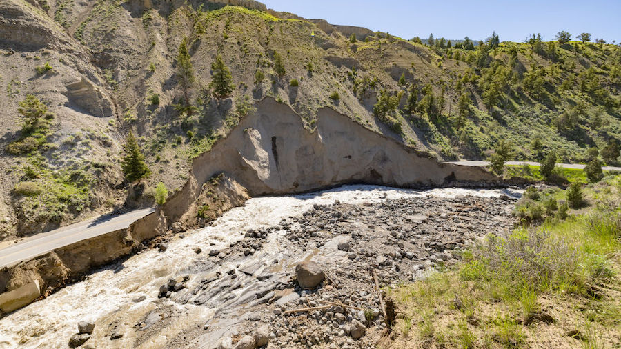 In this handout photo provided by the National Park Service, North Entrance Road is washed out by f...
