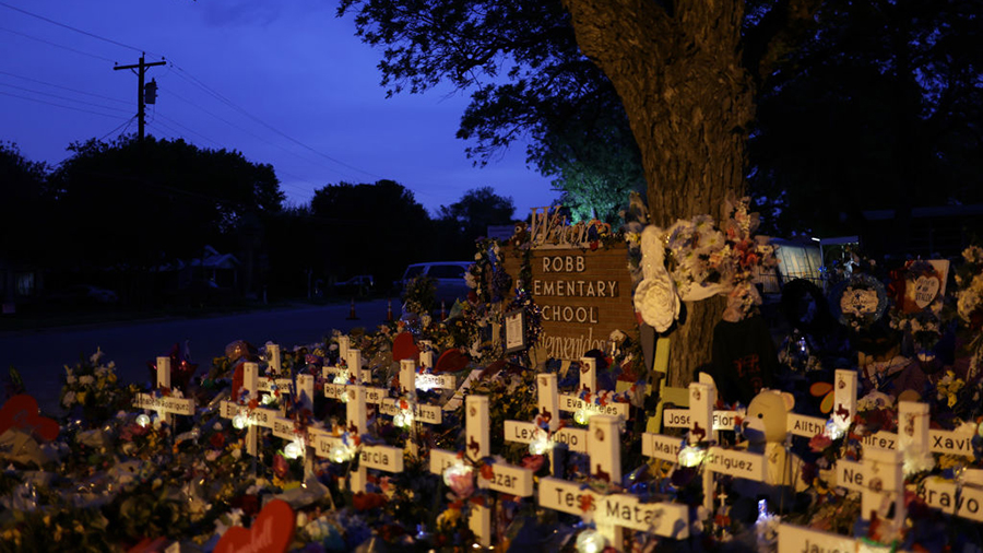 UVALDE, TEXAS - JUNE 03:  Wooden crosses are placed at a memorial dedicated to the victims of the m...