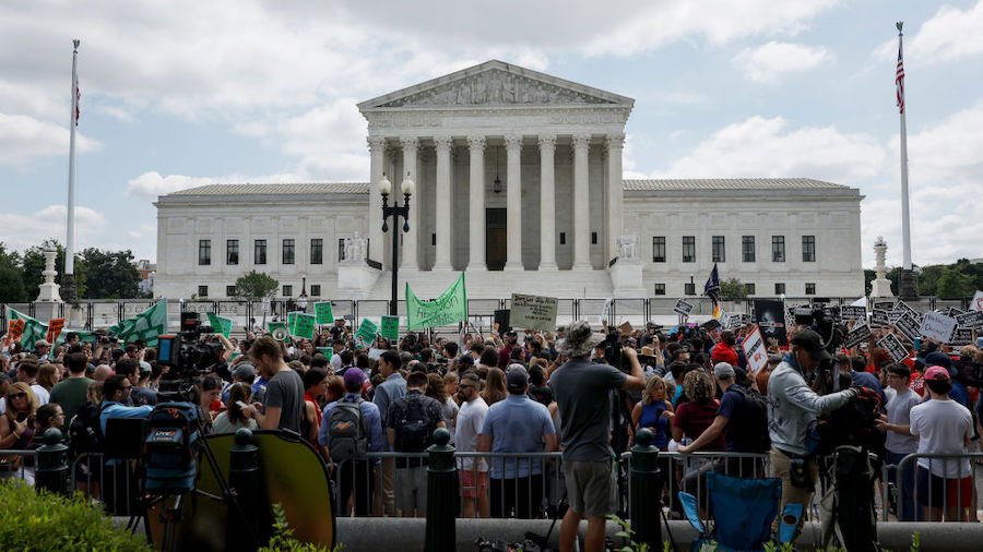 Abortion-rights and Anti-Abortion rights activists fill first street in front of the U.S. Supreme C...