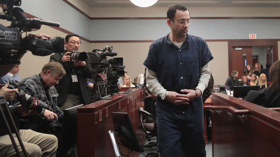 FILE: Larry Nassar appears in court to listen to victim impact statements prior to being sentenced ...