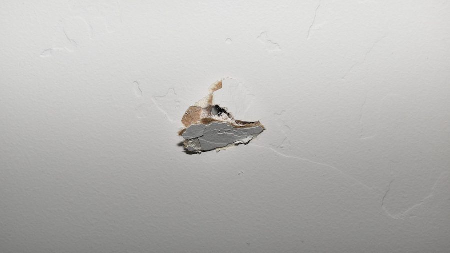 One of the damaged walls inside an apartment at 30 N. Orange Street in Salt Lake City. (Salt Lake C...