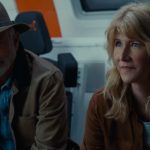 (from left) Dr. Alan Grant (Sam Neill) and Dr. Ellie Sattler (Laura Dern) in Jurassic World Dominion, co-written and directed by Colin Trevorrow.