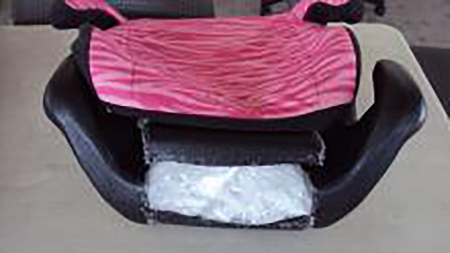 Methamphetamine is seen hidden in the child booster seats. (Credit: US Customs and Border Protectio...
