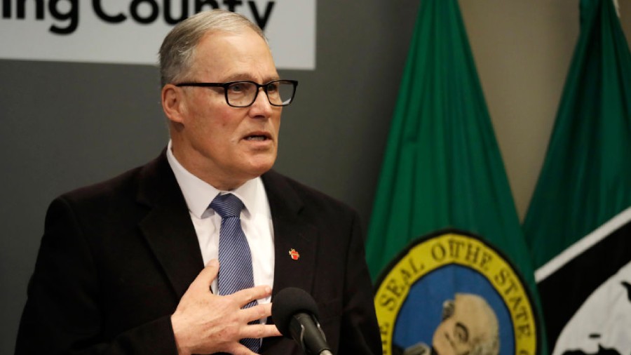 SEATTLE, WA - MARCH 16: Washington Gov. Jay Inslee, answers a question at a news conference about t...