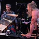 (L-R): Director Taika Waititi as Korg and Chris Hemsworth as Thor on the set of Marvel Studios' THOR: LOVE AND THUNDER. Photo by Jasin Boland. ©Marvel Studios 2022. All Rights Reserved.