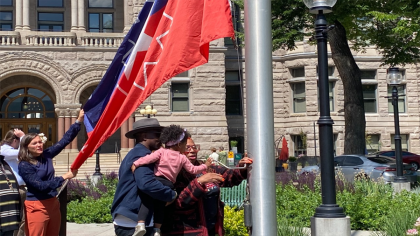 The Juneteenth flag flies over City Hall
