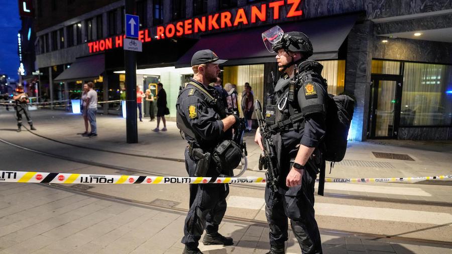 Security forces at the site of a shooting outside the London Pub in central Oslo, Norway, on June 2...