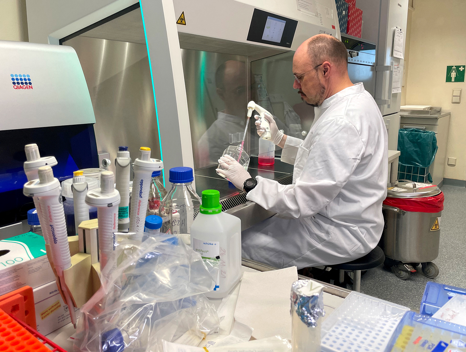 Head of the Institute of Microbiology of the German Armed Forces Roman Woelfel works in his laborat...