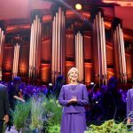 Kim Johnson, a member of The Tabernacle Choir at Temple Square, provides narration for the 2022 summer concert in the Conference Center on Temple Square in Salt Lake City on Thursday, July 14, 2022, during a dress rehearsal. (Intellectual Reserve, Inc.)