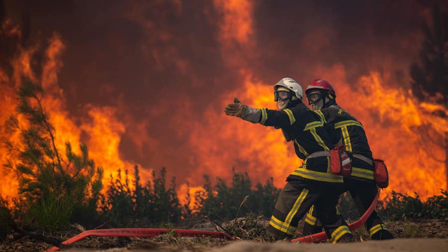 FILE: This photo provided by the fire brigade of the Gironde region (SDIS 33) shows firefighters un...