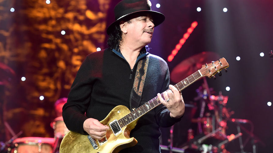 FILE: Carlos Santana performs onstage during the Pre-GRAMMY Gala and GRAMMY Salute to Industry Icon...