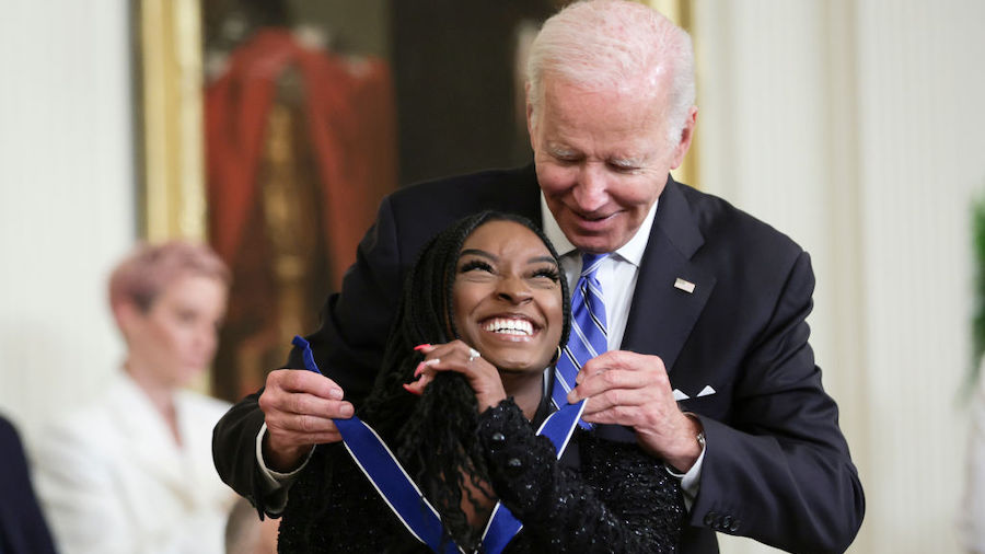 U.S. President Joe Biden presents the Presidential Medal of Freedom to Simone Biles, Olympic gold m...
