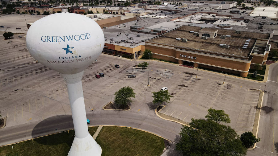 In this aerial view, a water tower is seen outside of the Greenwood Park Mall is seen on July 18, 2...