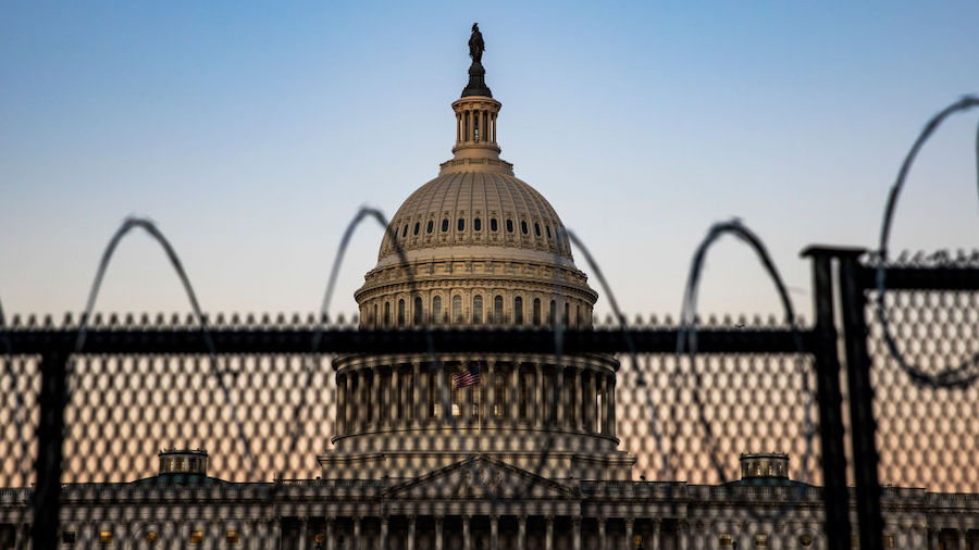 The US Capitol is seen as  National Guard and US Capitol Police stand guard on February 08, 2021 in...