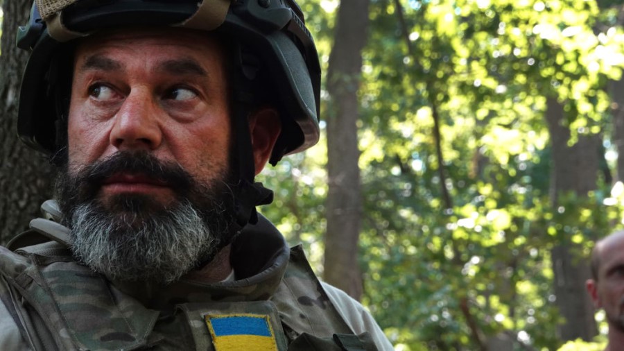 KRAMATORSK REGION, UKRAINE - JUNE 29: Soldiers with Ukraine's Territorial Defense stand guard at a ...