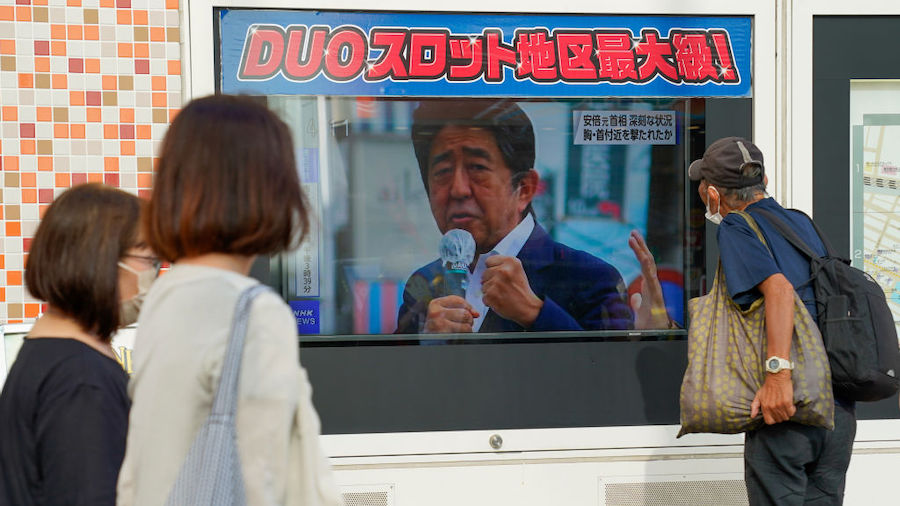 A screen broadcasting the news of Japan's former Prime Minister Shinzo Abe who has been shot while ...