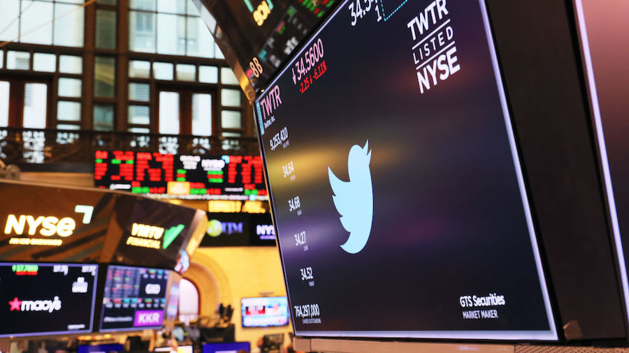 A Twitter logo is displayed on a screen at the New York Stock Exchange during morning trading on Ju...