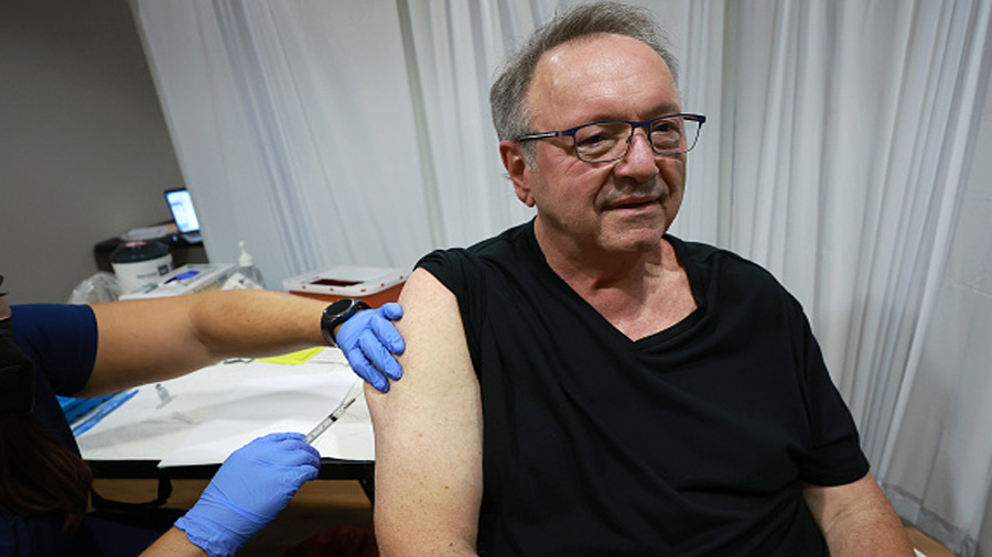 WILTON MANORS, FLORIDA - JULY 12: A healthcare worker  administers a vaccine to Ed Stupi for the pr...