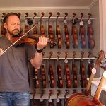 Chris Hobson, after suffering PTSD from a tour in Iraq, opened a violin shop in St. George, Utah. (Jeff Dahdah/KSL TV) 