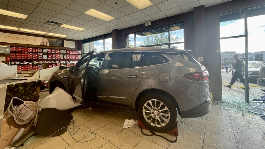 The SUV that drove into the Famous Footwear. (Credit: SLC PD)...
