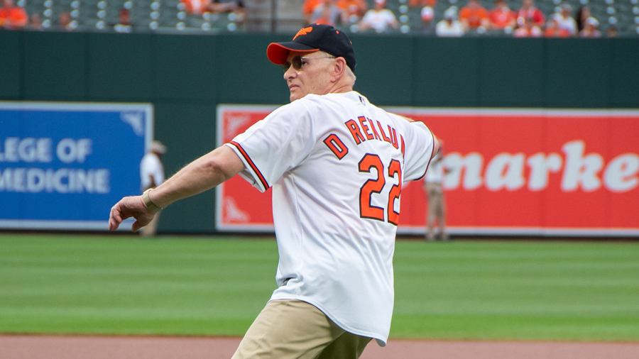 Elder Dale G. Renlund of the Quorum of the Twelve Apostles throws the first pitch during The Church...