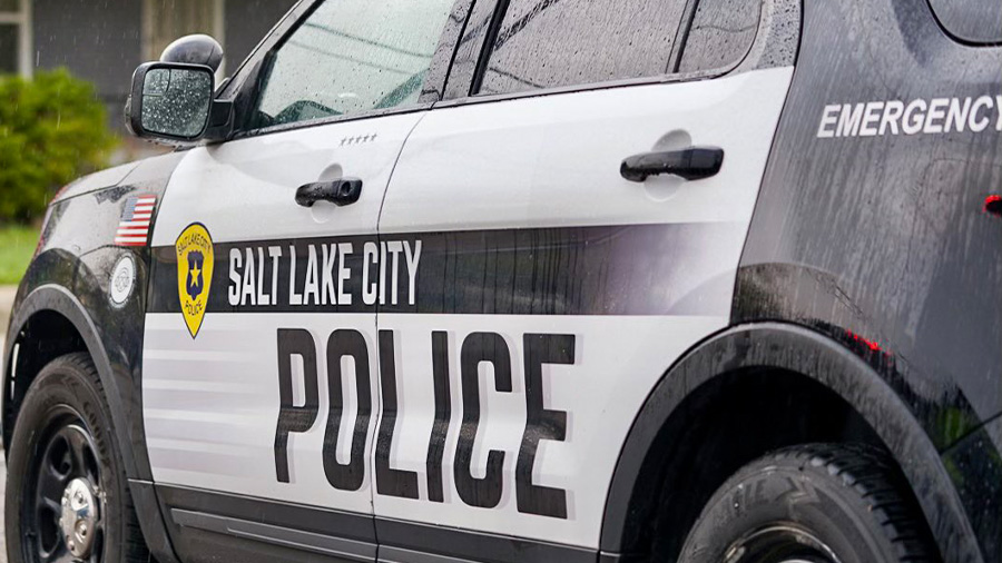 FILE - A Salt Lake City Police car blocking off streets...