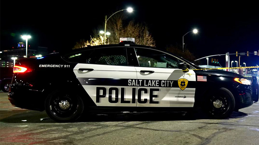FILE - A Salt Lake City Police car responding to a scene....