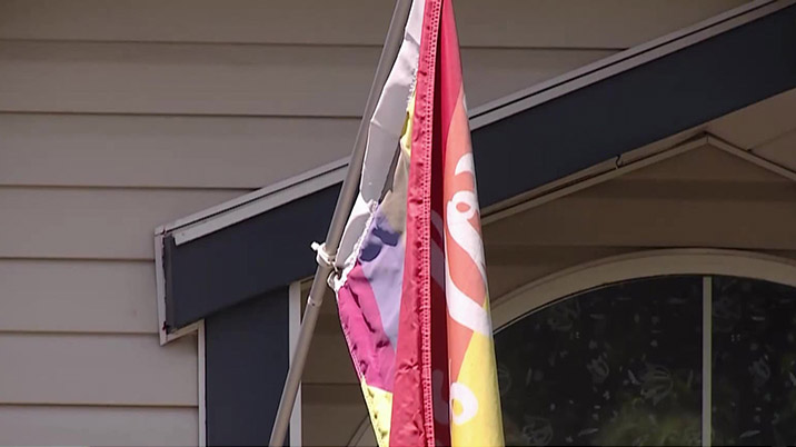 The flag outside of the victim's home....