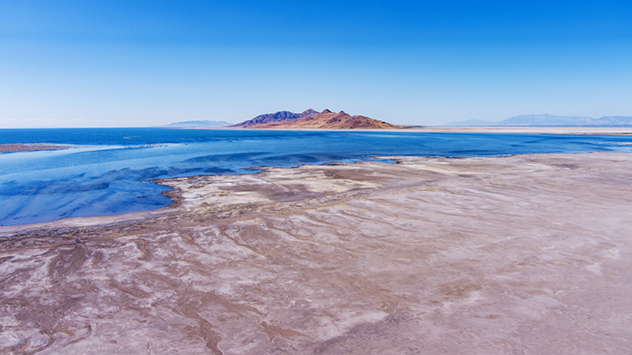 From north of the Great Salt Lake the evaporation of its waters is clear. Antelope Island sits in a...
