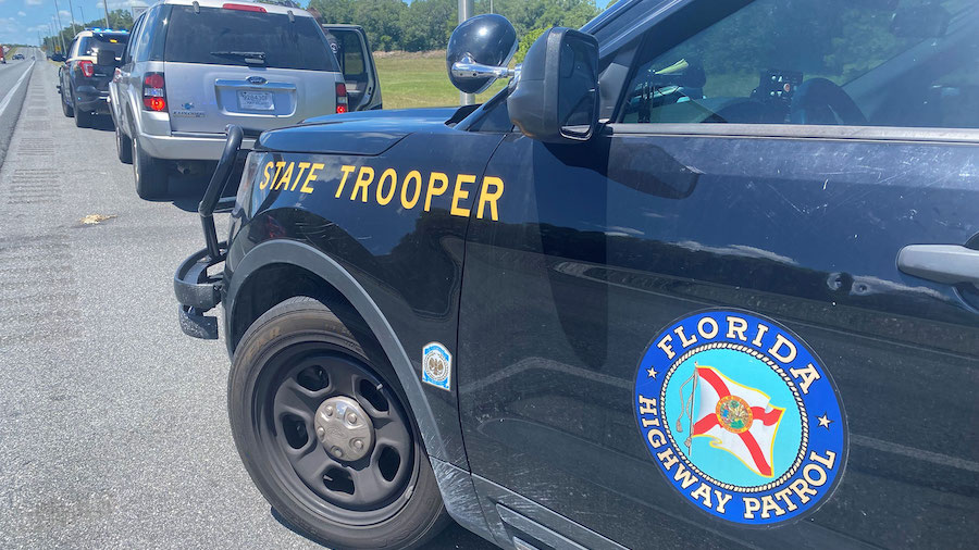 The Florida Highway Patrol makes an arrest on June 29. The Florida Highway Patrol arrested two peop...
