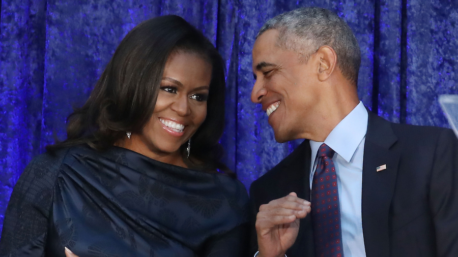 Former U.S. President Barack Obama and first lady Michelle Obama participate in the unveiling of th...