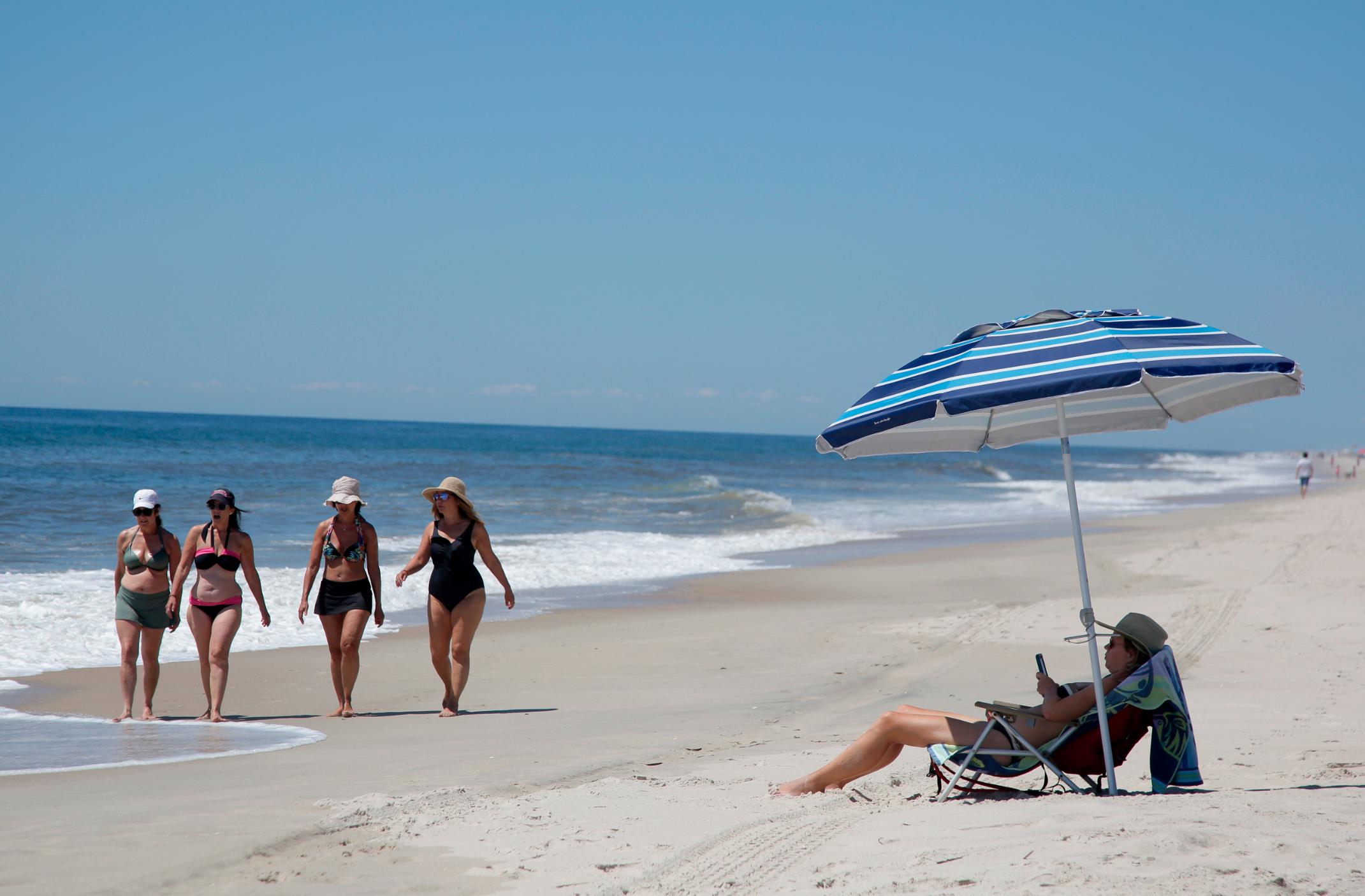 Officials urged swimmers in Long Island, New York, to be cautious after at least four people were i...