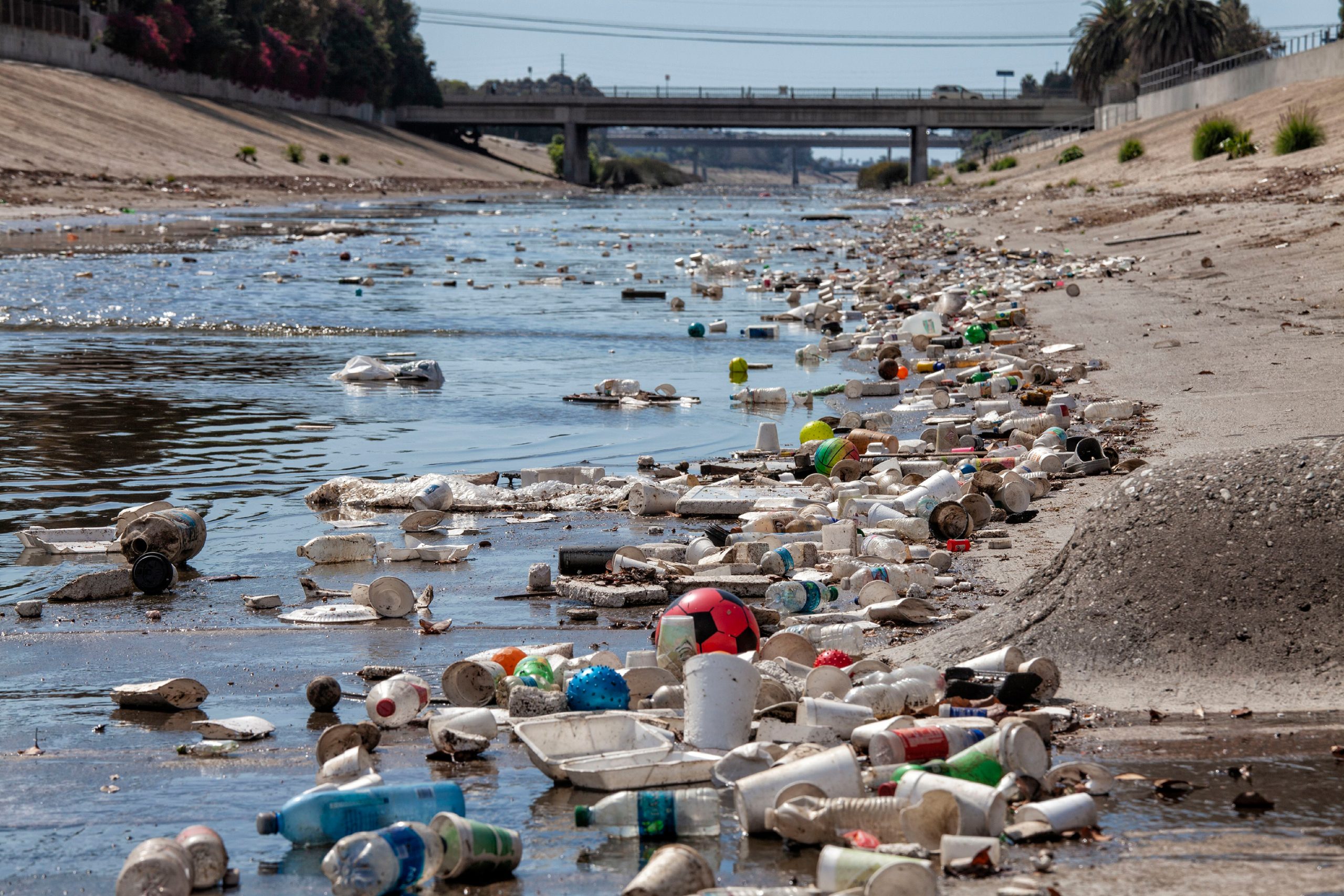 Large amounts of trash and plastic refuse collect in Ballona Creek after first major rain storm, Cu...