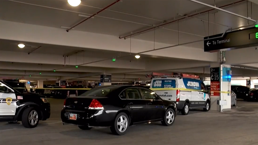 Police investigate the fatal incident at the Salt Lake City International Airport parking lot on Ap...