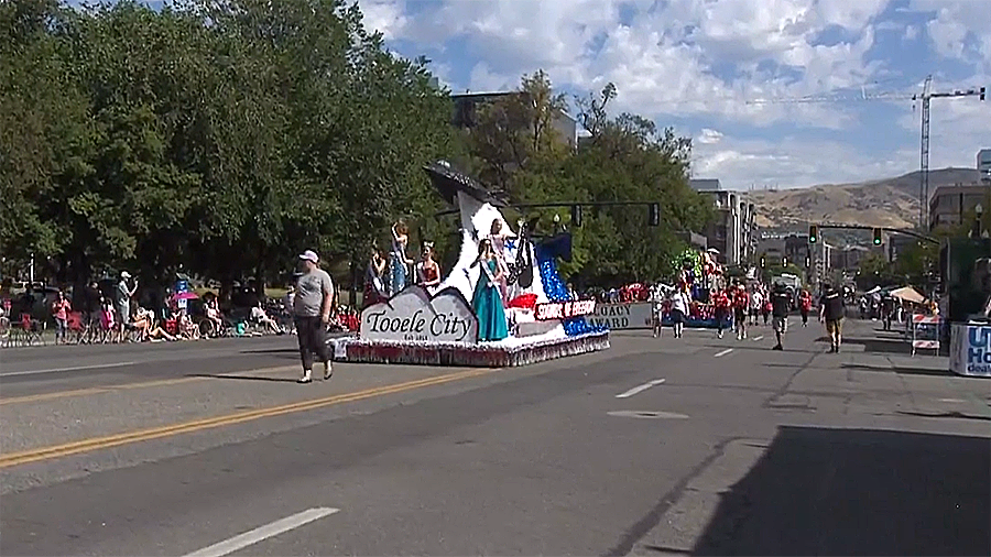 Spectators wave at the Tooele City "Sounds of Freedom" float during Saturday's Day of '47 Parade. (...