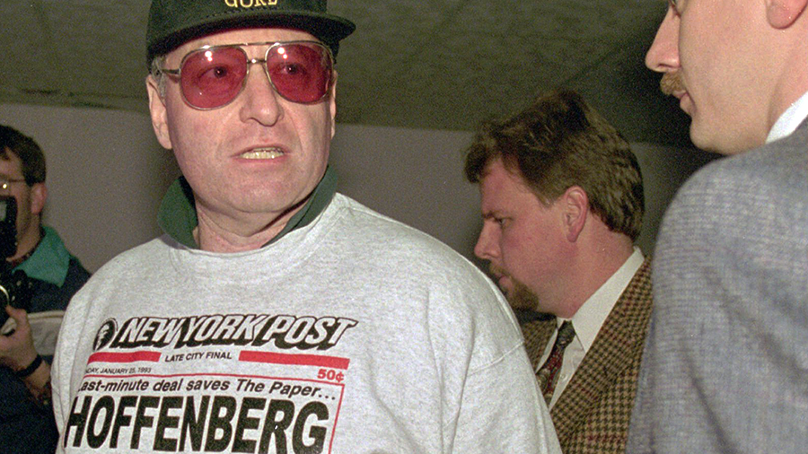 FILE - Steven Hoffenberg, left, is escorted by FBI agents in a Little Rock, Ark., parking garage af...