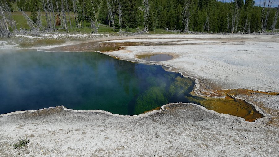 In this photo provided by the National Park Service is the Abyss Pool hot spring in the southern pa...
