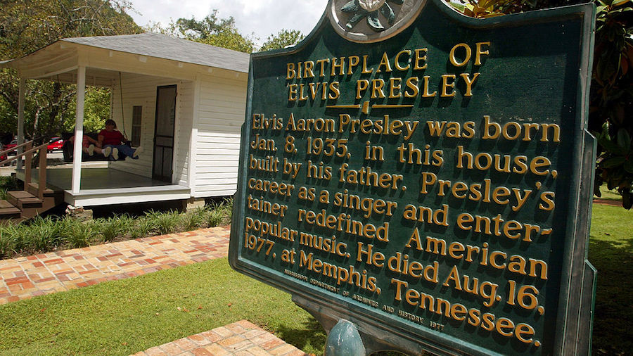 A historic marker is seen next to the two-room house where Elvis Presley was born January 8, 1935 d...