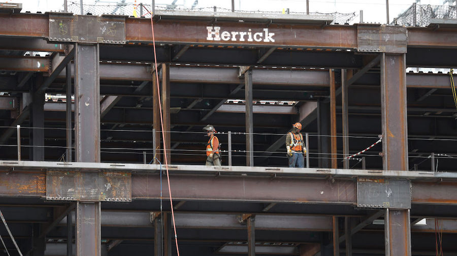 Construction crews work on a commercial building under construction on July 28, 2022 in San Francis...