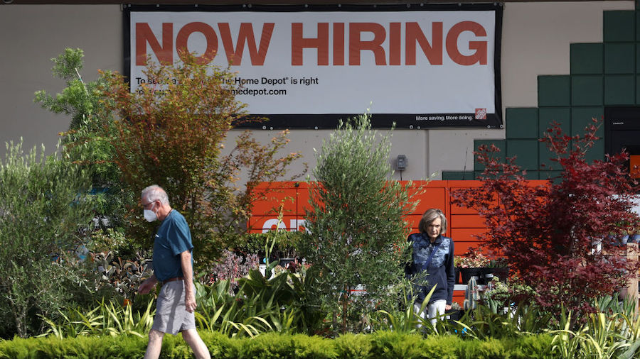 FILE: A "now hiring" sign is posted at a Home Depot store on August 05, 2022 in San Rafael, Califor...