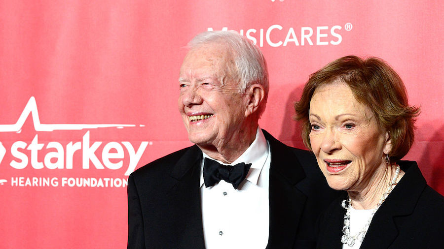Former U.S. President Jimmy Carter (L) and former First Lady Rosalynn Carter attend the 25th annive...