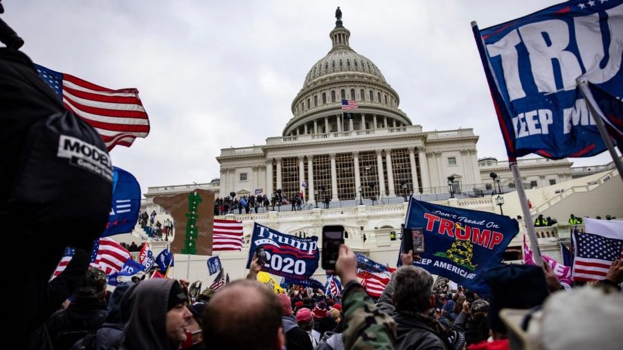 Pro-Trump supporters storm the U.S. Capitol following a rally with President Donald Trump on Januar...