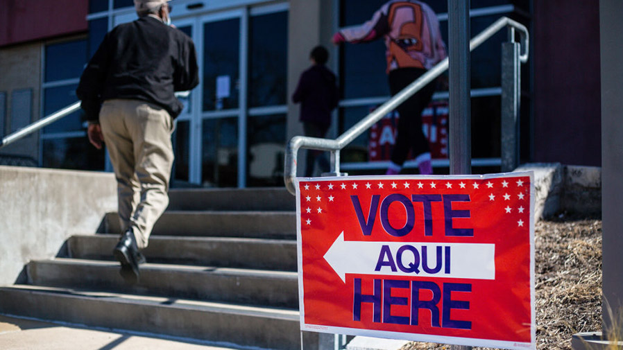 AUSTIN, TX - MARCH 01: People vote at the Carver Branch Library on March 1, 2022 in Austin, Texas. ...