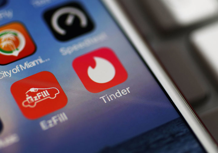 MIAMI, FL - AUGUST 14:  In this photo illustration, the icon for the dating app Tinder is seen on t...