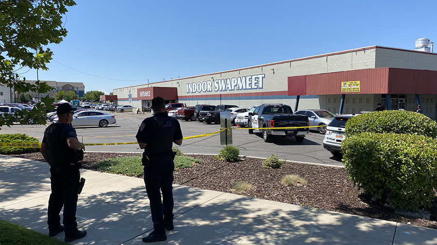 The scene of the officer involved shooting on August 7 outside of the Indoor Swap Meet....
