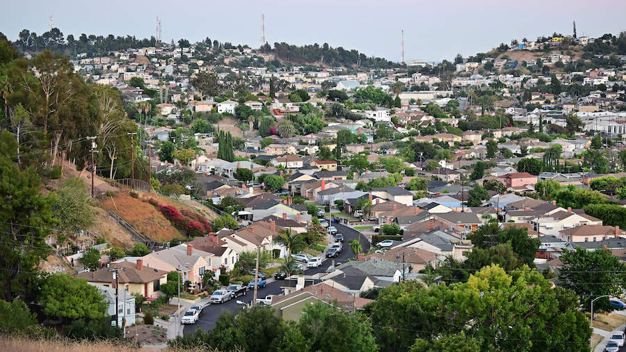 A view of houses in a neighborhood in Los Angeles, California, on July 5. Despite rising mortgage r...