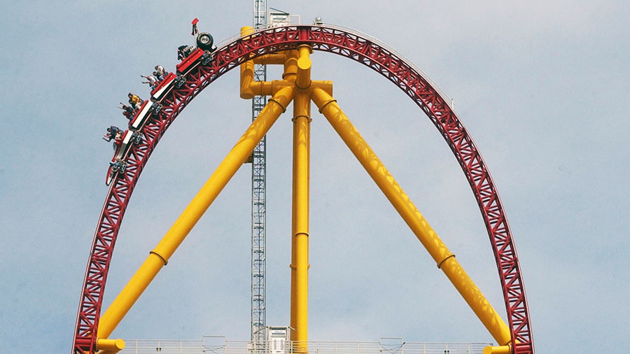 FILE - Riders on the Top Thrill Dragster speed along on May 1, 2003, at Cedar Point Amusement Park,...