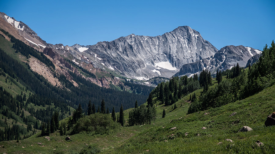 Capitol Peak in Colorado has an elevation of about 14,137 feet. The mountain is 14 miles west of As...