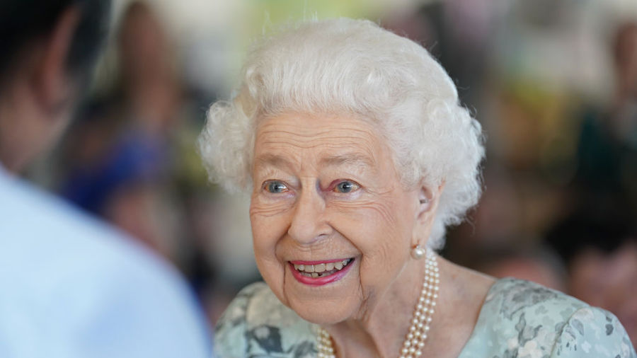 Queen Elizabeth II smiles during a visit to officially open the new building at Thames Hospice on J...