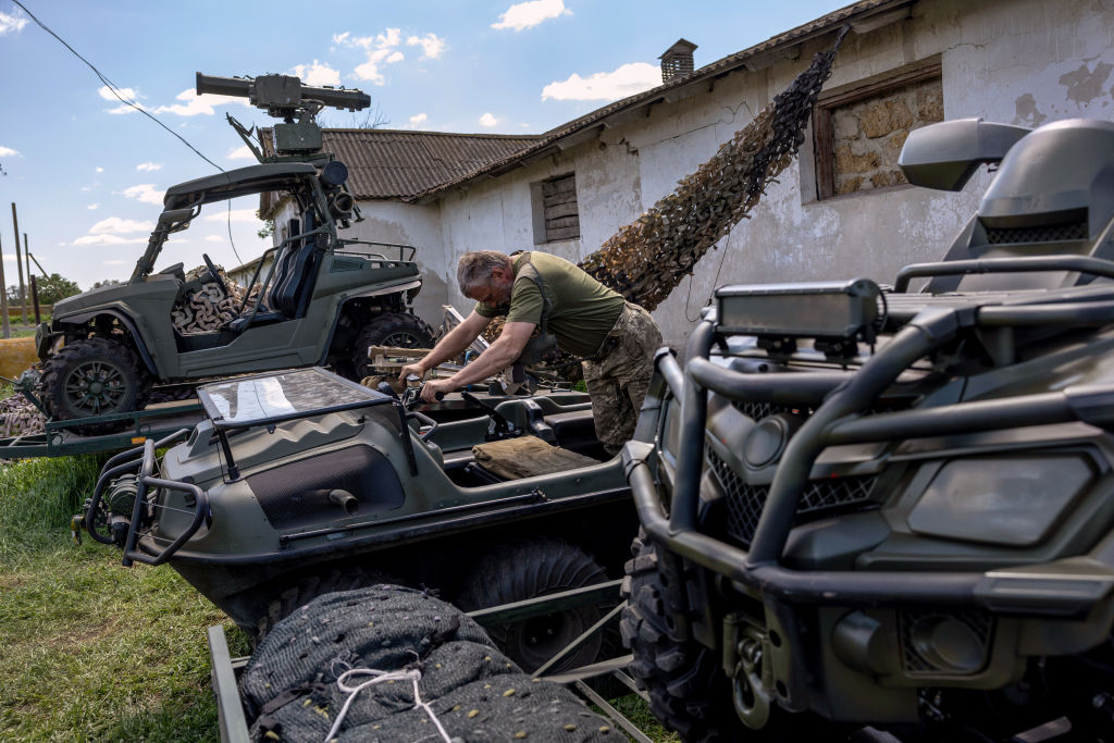 KHARKIV OBLAST - MAY 20: Ukrainian Army Major Oleh "Serafim" Shevchenko checks the steering on an a...
